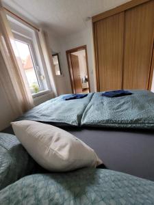 Postel nebo postele na pokoji v ubytování Haus Am Beckerberg im Harz