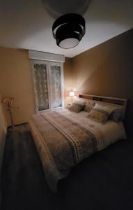 LE TOURISTIC Appartements客房内的一张或多张床位