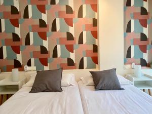 Posteľ alebo postele v izbe v ubytovaní Xuloss Apartments 1