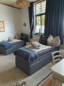 Postel nebo postele na pokoji v ubytování Pension Mahler wir sind günstig, Wittenberge, Perleberg, Heiligengrabe, Wittstock ,Pritzwalk, Kyritz, Putlitz, an der A 24