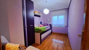 a small room with a bed and a window at Garnacha Tinta VT-LR-2179 in Haro