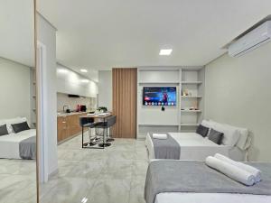 Η κουζίνα ή μικρή κουζίνα στο Studio Novíssimo no Centro para 4 pessoas