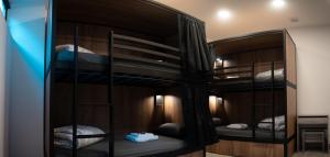 a bunk room with three bunk beds in it at Only for Women Hostel Madrid-Sol in Madrid