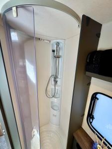 a walk in shower in an rv at Caravana Juliana Hobby 545 z widokiem na Jezioro in Swaderki +78 photos