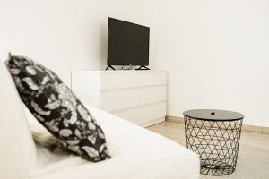 TV a/nebo společenská místnost v ubytování Statek