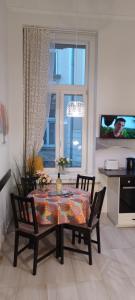 A television and/or entertainment centre at Palace3 Apartment