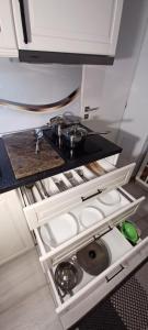 A kitchen or kitchenette at Palace3 Apartment