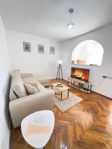 Posezení v ubytování Fusha Apartment