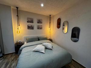 Postel nebo postele na pokoji v ubytování Isula SeaView Apartments