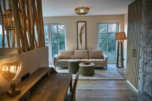 Posezení v ubytování Das Oswald's Boutique Hotel