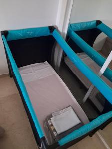 Кровать или кровати в номере COSTA LAGO BEACH