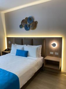 Voodi või voodid majutusasutuse Hotel Cumbayá Sanvy toas