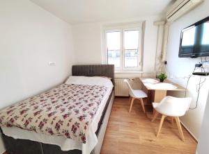 Postel nebo postele na pokoji v ubytování Apartment Twin 1