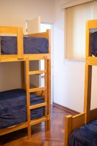 Μία ή περισσότερες κουκέτες σε δωμάτιο στο Gutierrez Hostel