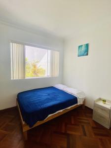 Ένα ή περισσότερα κρεβάτια σε δωμάτιο στο Gutierrez Hostel