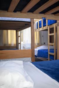 Ένα ή περισσότερα κρεβάτια σε δωμάτιο στο Gutierrez Hostel