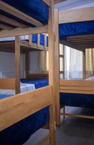 Ένα ή περισσότερα κρεβάτια σε δωμάτιο στο Gutierrez Hostel