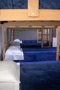 Ένα ή περισσότερα κρεβάτια σε δωμάτιο στο Gutierrez Hostel