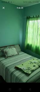 Кровать или кровати в номере Casa Pé na Areia +9 фотографий