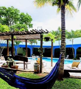 Bazén v ubytování Área de lazer 3 suítes 50 ps nebo v jeho okolí