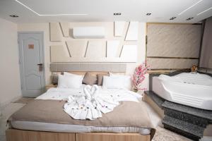 Lova arba lovos apgyvendinimo įstaigoje Quantum Pyramids View INN