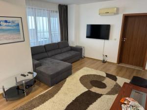 Et tv og/eller underholdning på Panoramic Sea View Apartment