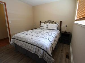 Ένα ή περισσότερα κρεβάτια σε δωμάτιο στο COH1261 - Nature's Gem home