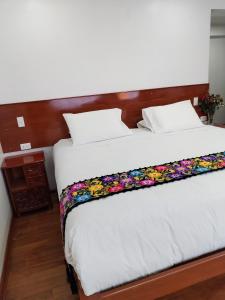 Letto o letti in una camera di Kantu hotel
