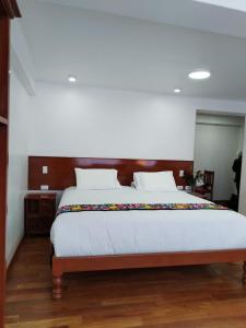 Letto o letti in una camera di Kantu hotel