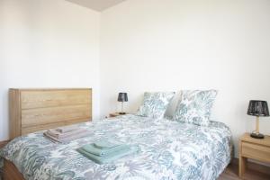 Ένα ή περισσότερα κρεβάτια σε δωμάτιο στο Appartement la Dolce Via