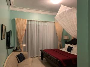 Postel nebo postele na pokoji v ubytování Lakepoint Villa