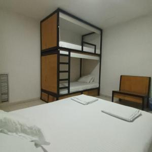 Letto o letti in una camera di Nueve Uno Hostel