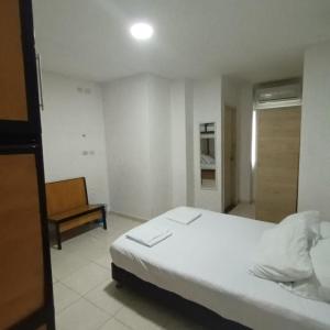 Letto o letti in una camera di Nueve Uno Hostel