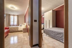 Postel nebo postele na pokoji v ubytování Cà Vivaldi penthouse 5terreparco