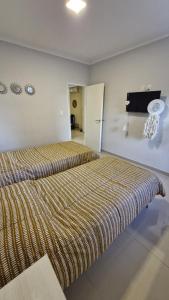 Postel nebo postele na pokoji v ubytování Departamento Quality Belgrano