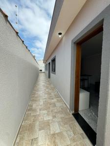 Φωτογραφία από το άλμπουμ του Casa em Itanhaém com Piscina Alto Padrão Próximo da Praia σε Itanhaem