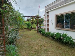 Zahrada ubytování Casa Inteira - 3 Quartos - 11 Pessoas - Piscina infantil - 200m da praia