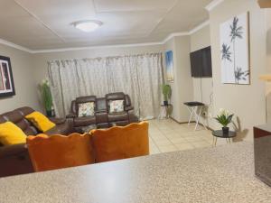 Μια τηλεόραση ή/και κέντρο ψυχαγωγίας στο Self Catering luxury Apartment in Witbank