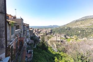a view of a town from a hill at L'Orologio in Tivoli