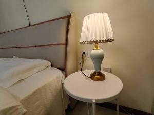 Postel nebo postele na pokoji v ubytování Central Street Apartment 1