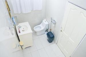 Ένα μπάνιο στο Luxury Villa Ensuite Room 4