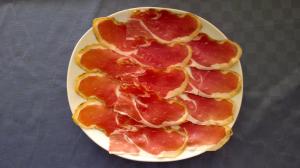 a plate of blood oranges on a table at Domus Viatoris in Sahagún