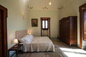 Postel nebo postele na pokoji v ubytování La Magione