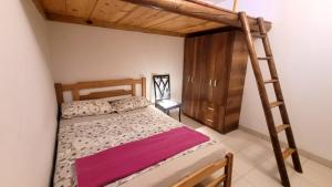 Postel nebo postele na pokoji v ubytování Republika Divanga Homestel