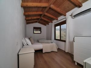 a white bedroom with a bed and a window at Ionian Manor Estate 2 in Palermo +45 photos