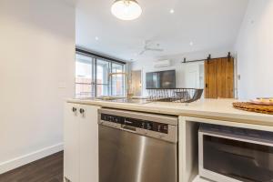 A kitchen or kitchenette at Coastal Getaway with Parking and Steps from the Beach