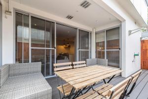 A balcony or terrace at Coastal Getaway with Parking and Steps from the Beach