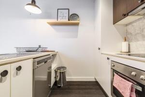 A kitchen or kitchenette at Coastal Getaway with Parking and Steps from the Beach