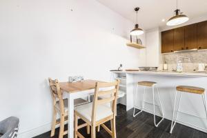A kitchen or kitchenette at Coastal Getaway with Parking and Steps from the Beach