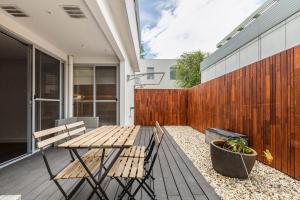 A balcony or terrace at Coastal Getaway with Parking and Steps from the Beach
